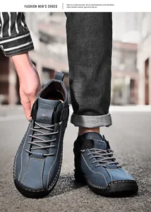High quality detail shot of men's casual blue leather shoes with handmade stitching