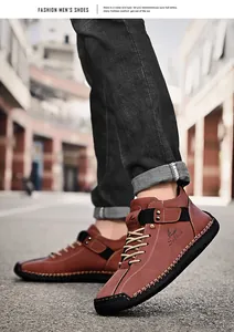 Close-up detail of brown men's casual leather shoes with hand-stitched seams and Salkin logo