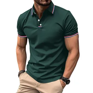 Detailed view of men's dark green polo shirt with striped collar and cuff accents