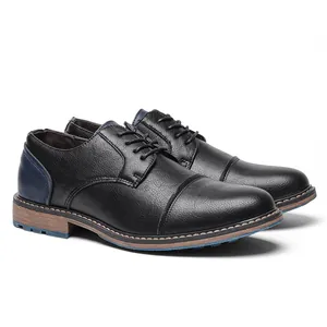 Black leather business casual shoes with blue heel accent and wooden sole texture.