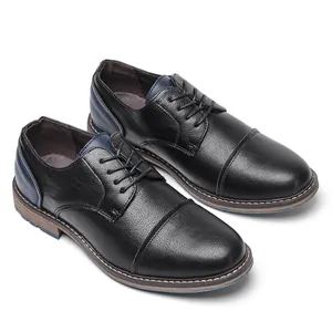 Classic men's black business dress shoes with navy blue accents and lace-up design