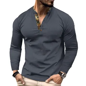Detailed macro view of men's grey waffle knit Henley shirt with contrast collar