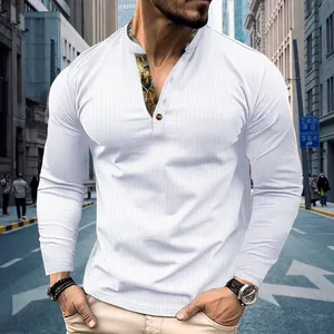 Detailed view of white waffle knit men's long sleeve polo shirt with contrast collar