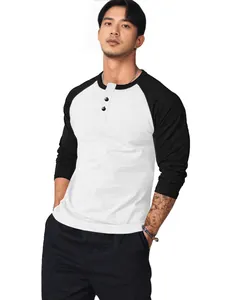 Stylish men's slim fit raglan long sleeve Henley T-shirt with black and white color block design.