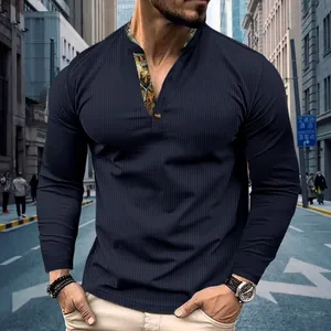 Close-up of men's waffle knit long-sleeved polo shirt with patterned inner placket.