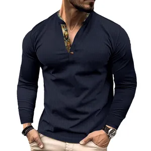 Detailed view of men's dark blue waffle knit polo shirt with contrast collar