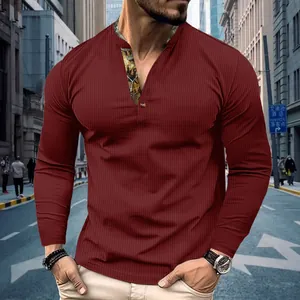 Detailed view of men's burgundy waffle knit long sleeve polo with patterned placket