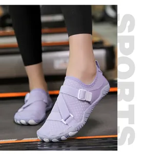 Detailed view of lightweight purple aqua shoes on a treadmill for gym training.