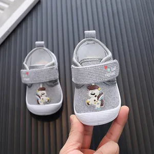 Grey cartoon baby walking shoes for infants 0-2 years with Small Elephant strap detail