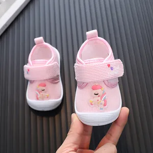 Adorable pink cartoon baby walker shoes with soft sole and velcro strap for toddlers