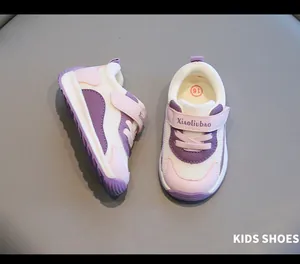 Detailed view of breathable mesh toddler sneakers in purple and pink tones.