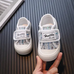 Chaussures de marche en tweed pour bébés filles avec bandes velcro pratiques