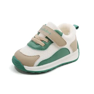 Breathable mesh baby walking shoes with soft sole and velcro strap in green and beige colors