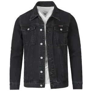 Front view detail of a men's vintage washed black denim jacket with chest pockets