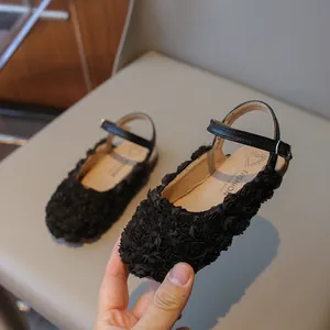 Black girls' princess sandals with elegant 3D floral textures and strap buckle