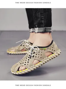 Nahaufnahme von atmungsaktiven Herren-Sandalen mit Retro-Lochmuster, Schnürung und dicker Sohle.