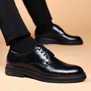 Elegant black lace-up business dress shoes for men with textured leather finish