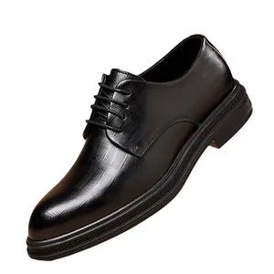 Elegant black men's lace-up business dress shoes featuring textured leather grain