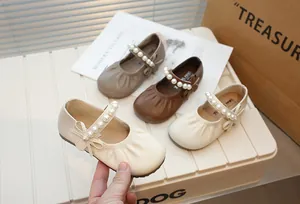 Retro girl's Mary Jane shoes featuring pearl strap and bow detail in various colors