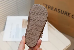 Detailed view of non-slip wavy sole on retro girl's Mary Jane shoes
