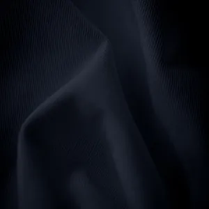 Detalle macro de la textura de tejido de punto azul marino para camiseta de hombre