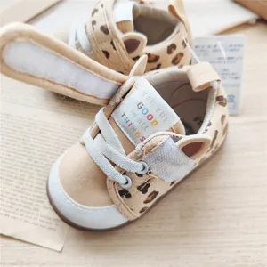 Close-up of leopard print baby walking shoes with soft sole and Velcro closure