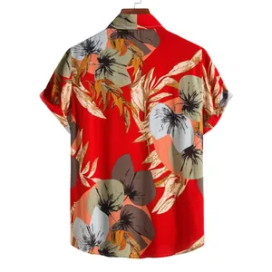 Back view of a vibrant red Hawaiian short-sleeve shirt featuring large tropical leaf prints.