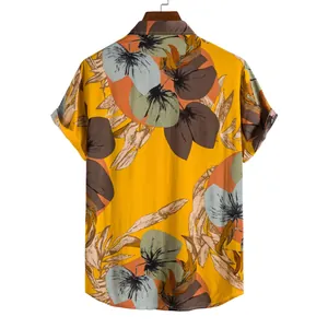 Detailed back view of a yellow Hawaiian floral short sleeve shirt with tropical print.