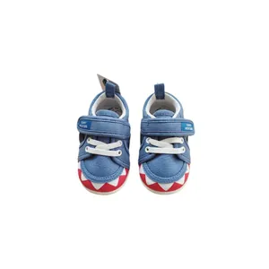 Blue canvas soft-sole baby walking shoes with cartoon shark teeth design and velcro straps