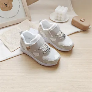 Detail of MLW kids functional sneakers showing breathable mesh and Velcro strap