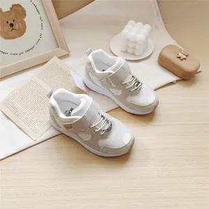 Beige MLW children's functional sneakers displayed in a cozy and clean lifestyle setting
