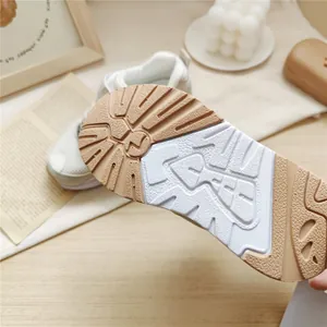Close-up of anti-slip sole design on minimalist kids functional sneakers