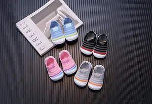 Four pairs of colorful baby fly-knit walking shoes with mesh design for 0-2 years.
