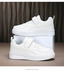 Side profile of children's white leather low-top sneakers for school and daily wear
