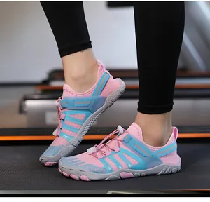 Professional close-up view of pink and blue breathable water shoes on a gym treadmill