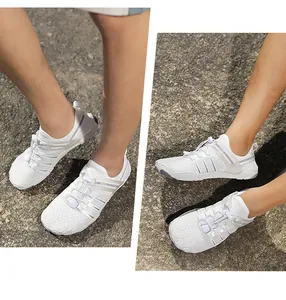 Breathable white wading shoes for swimming and beach activities on stone ground