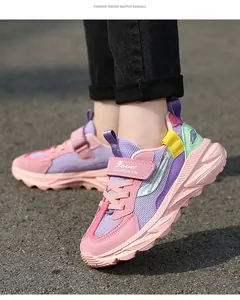 Detail view of girls' breathable pink and purple mesh sneakers with velcro strap
