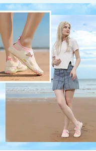 Detail view showing breathable pink five-finger water shoes for beach and snorkeling