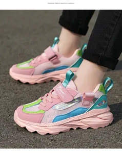 Detailed side view of pink girls mesh sneakers with holographic accents and Velcro