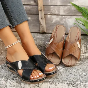 Comfortable vintage wedge sandals for women with decorative stitching and cross-straps