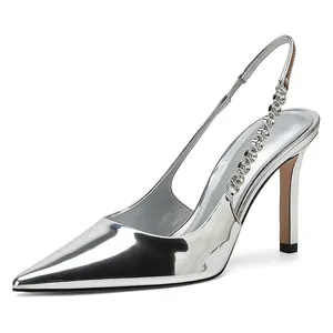 Detailed side view of silver metallic stiletto pumps with rhinestone strap