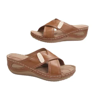 Retro brown wedge sandals for women with stylish white contrast stitching and cross straps