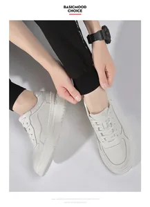 Detailed view of white leather casual sneakers for men with breathable foam sole.