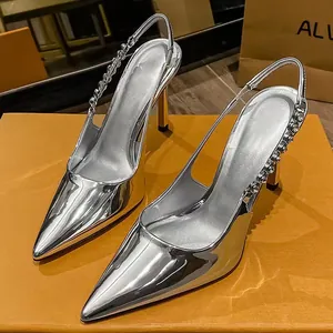 Elegant silver metallic pointed-toe slingback high heels featuring rhinestone chain strap