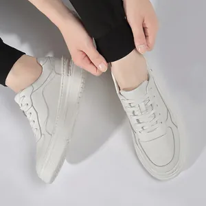 Classic white leather casual sneakers with comfortable foam sole and lace-up design
