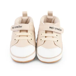 Close-up of beige baby pre-walker shoes with magic prewalker velcro straps
