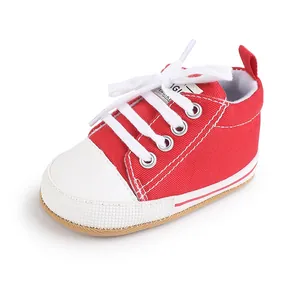 Zapatillas de lona roja para bebés de 0 a 1 año con puntera de goma blanca