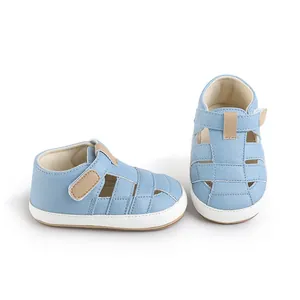 Detailed view of light blue baby walking shoes with breathable hollow design for infants