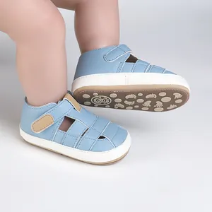 Comfortable light blue baby walking shoes with anti-slip footprint sole and velcro strap