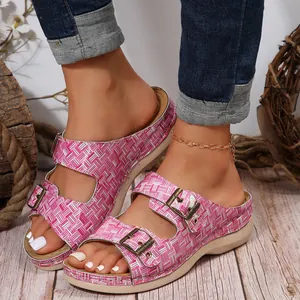 Detailed macro view of pink checkered double buckle wedge sandals for women summer fashion